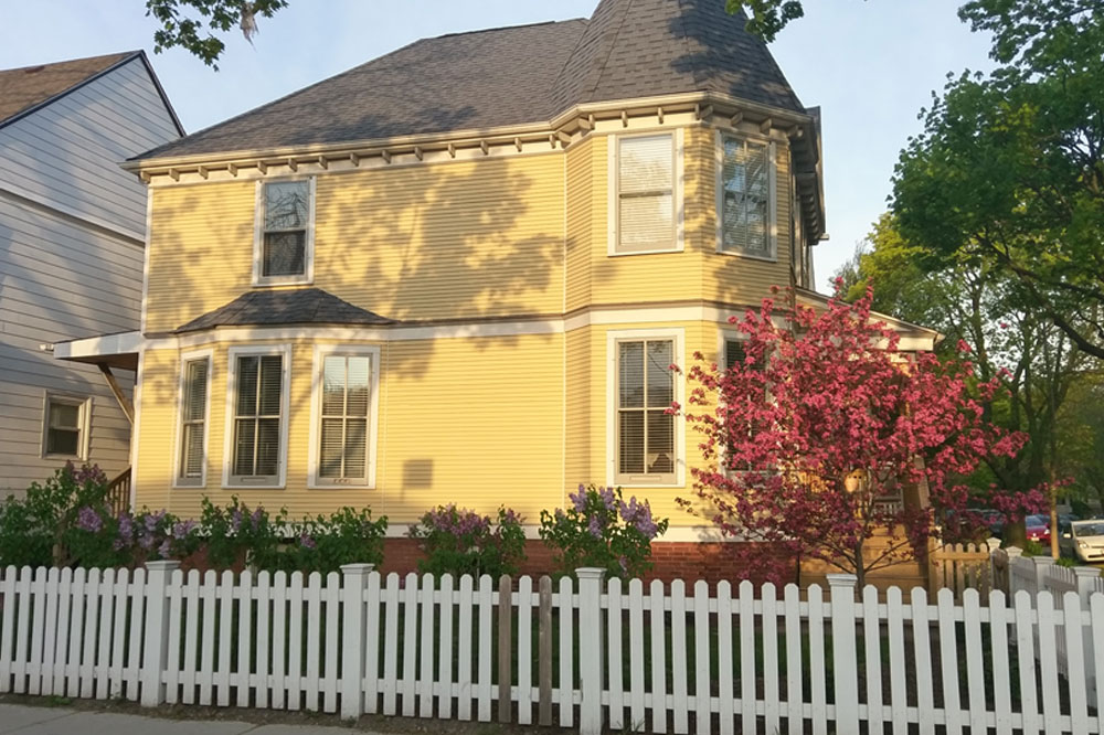 Exterior photo of a yellow building